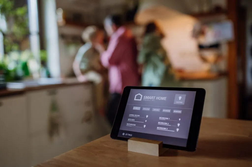 Smart Home automation system on a tablet in Cheverly, Maryland. Control lighting, temperature, and security with ease. Home automation technology.