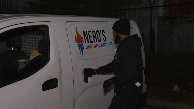 Technician opening Nero's Heating and Air service van at night, showcasing the company's logo and commitment to reliable HVAC services.
